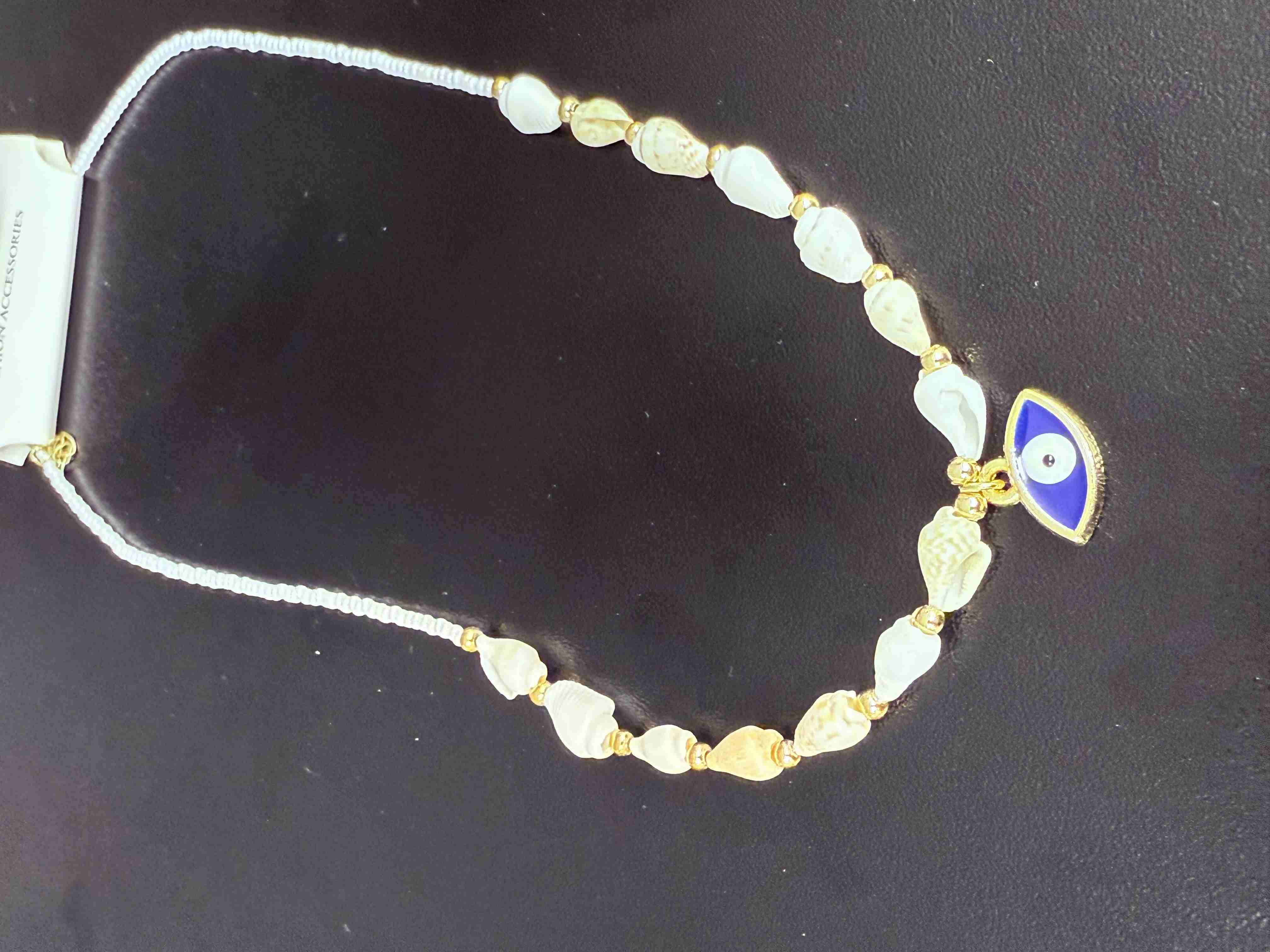 Deniz kabuğu kolyesi