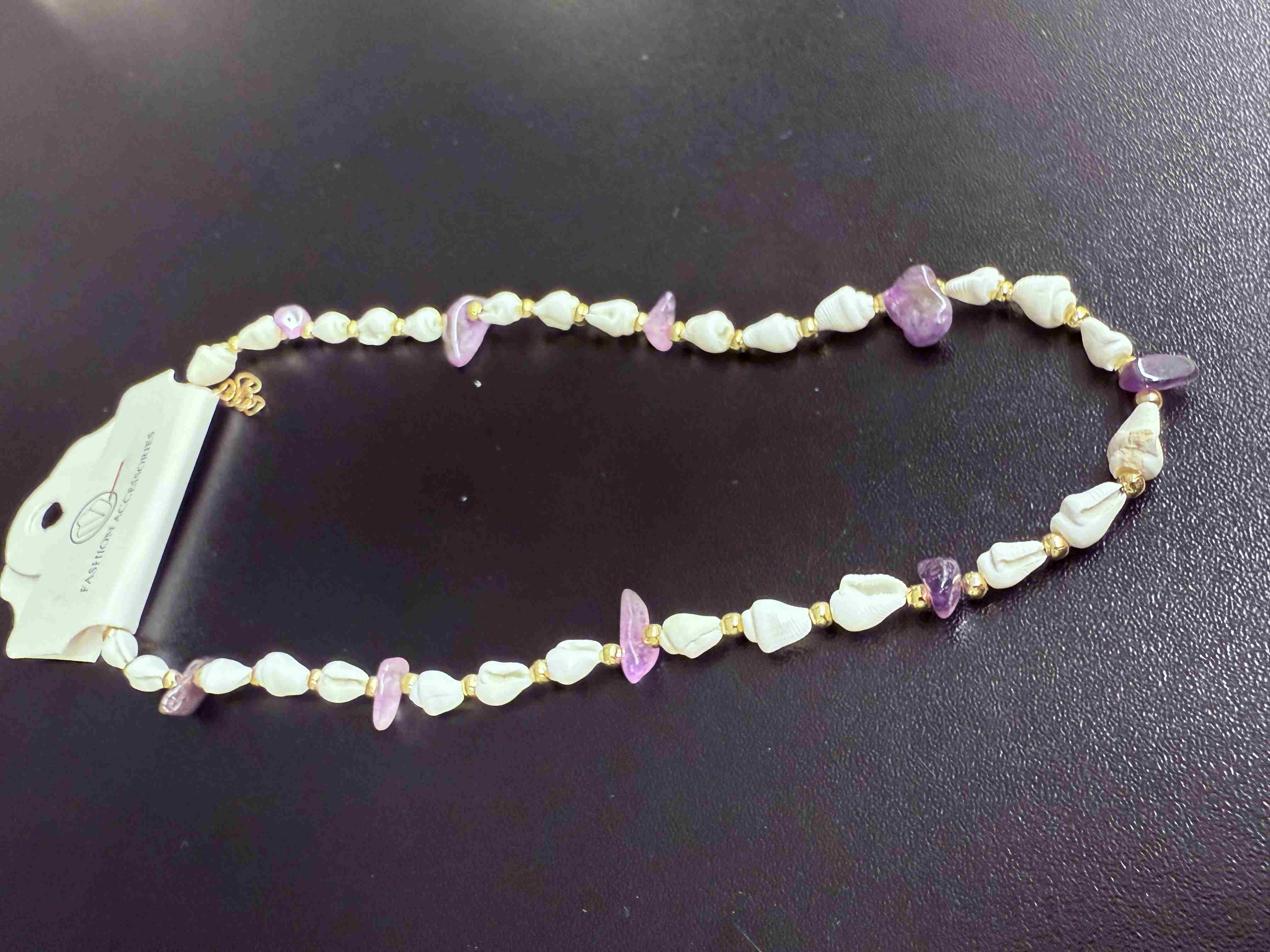 Deniz kabuğu kolyesi