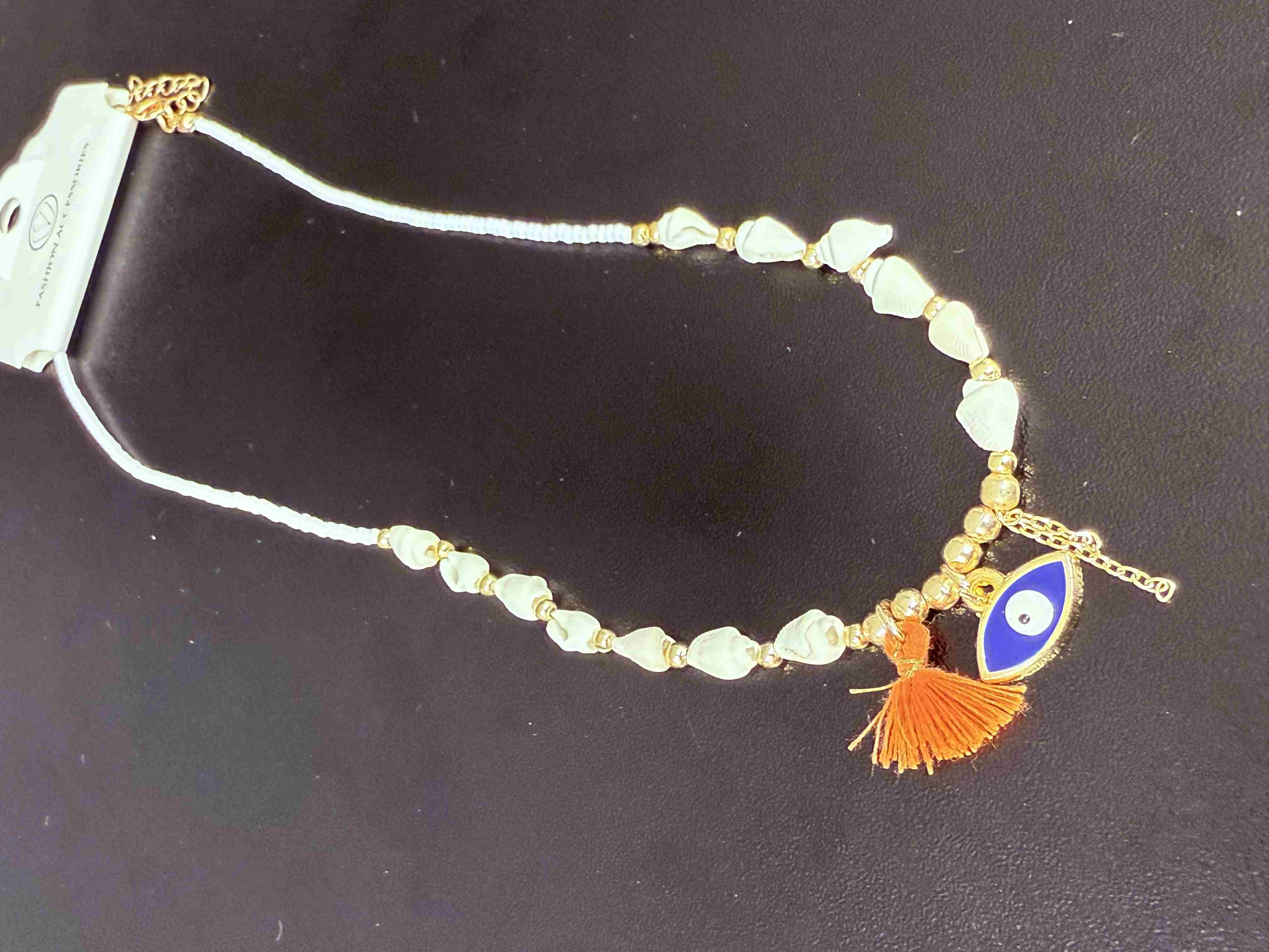 Deniz kabuğu kolyesi